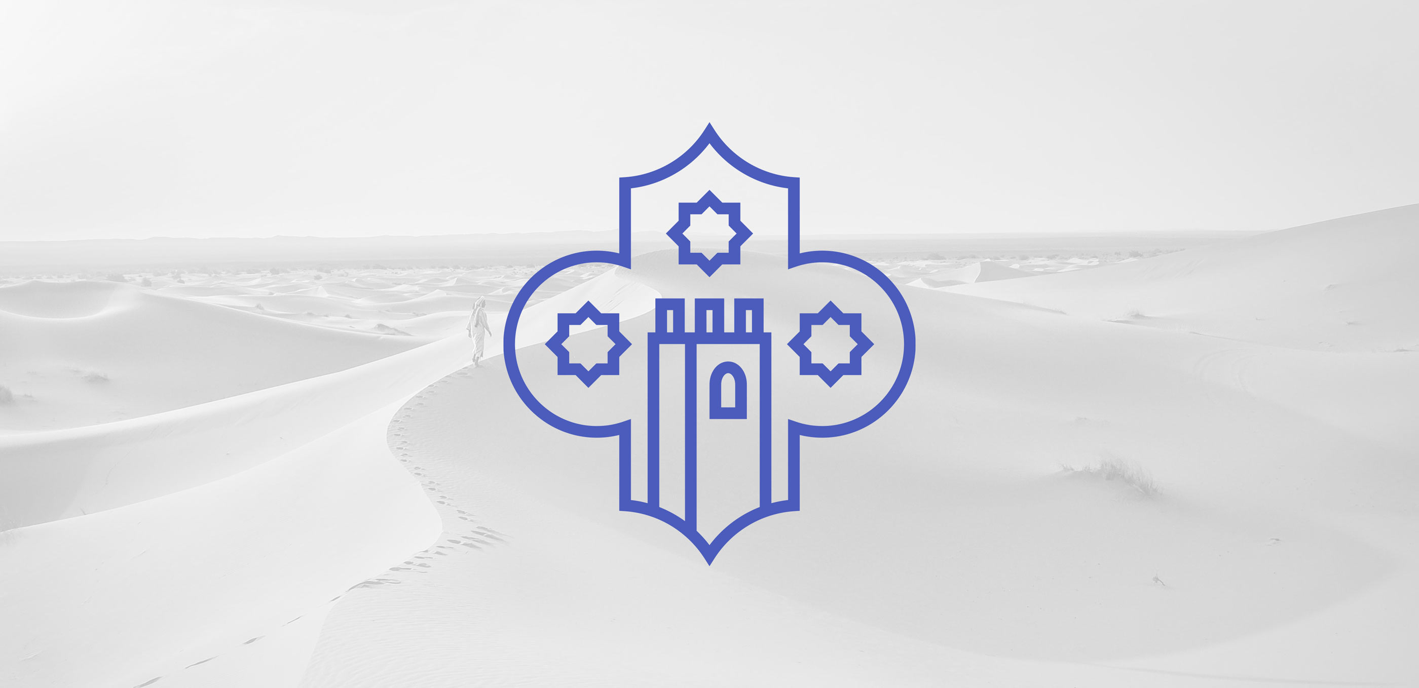 Meharee Morocco Tours Logo Mark Design Superimposed Over Desert Image by Karbon Branding