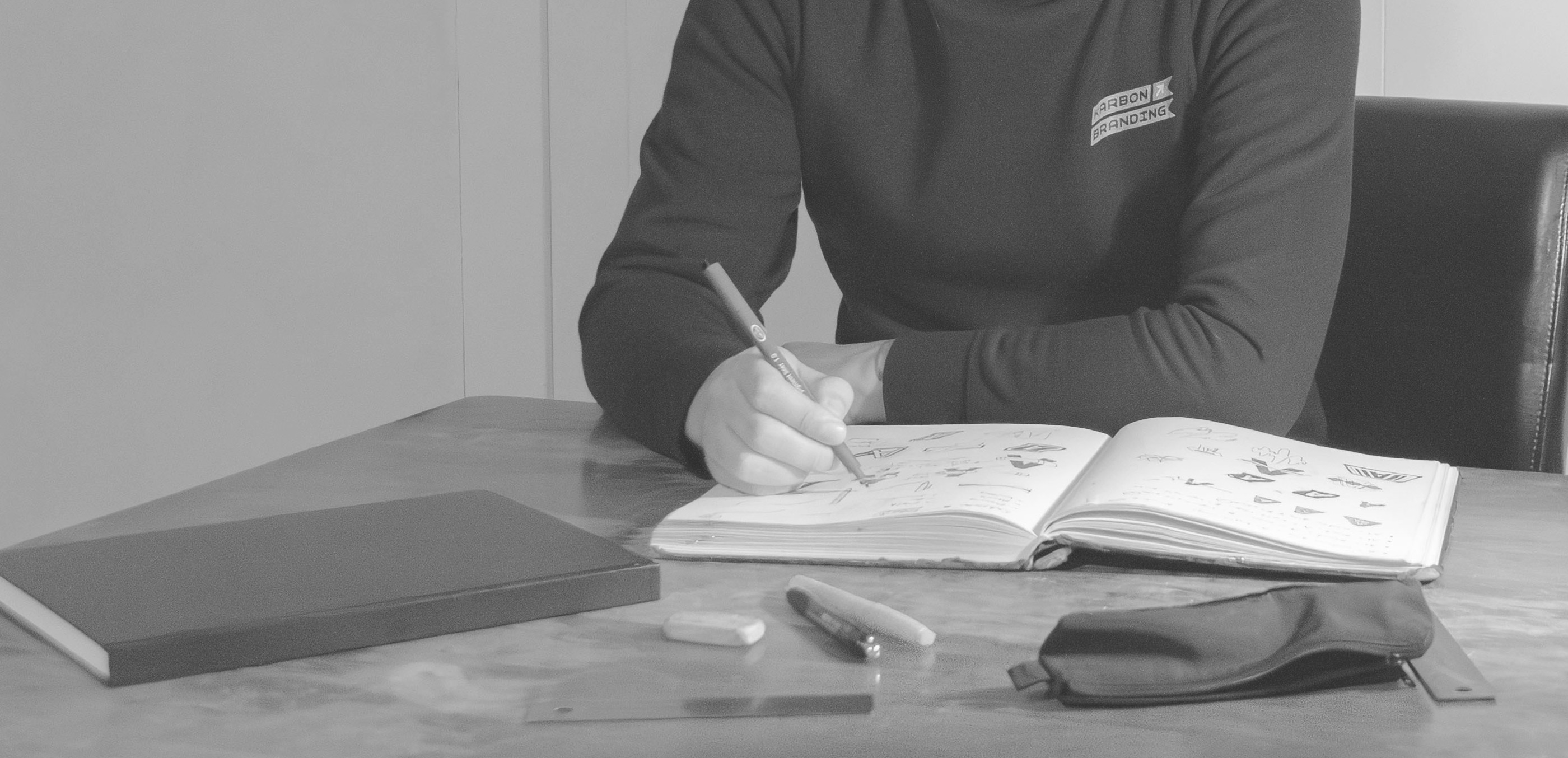 Alex Banman Working on a Logo